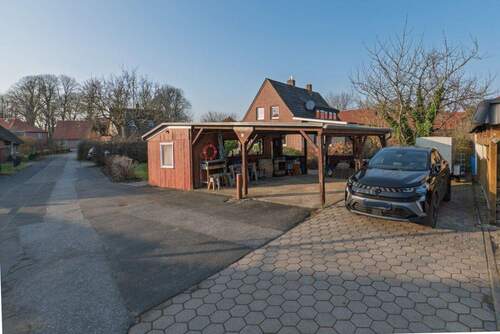 Ansicht Carport - 6 Zimmer Einfamilienhaus zum Kaufen in Seester