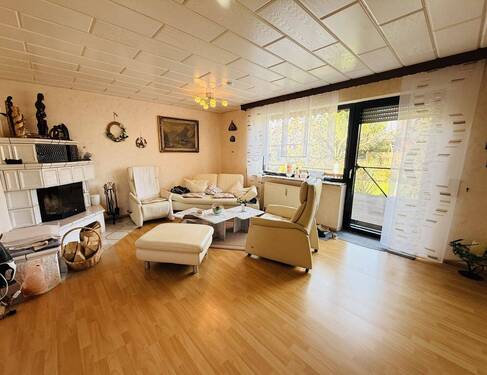 12 Wohn-Esszimmer mit Kamin und Terrassenzugang - 