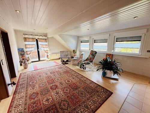 24 Wohnzimmer mit Terrassenzugang 1.OG - 