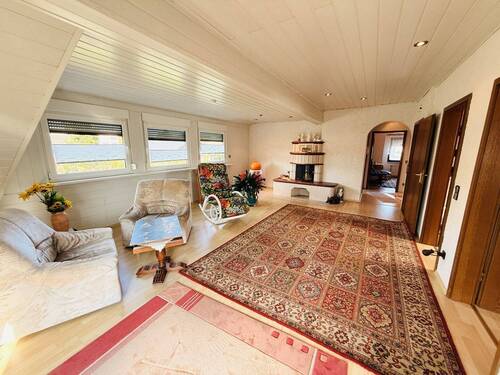 25 Wohnzimmer mit Terrassenzugang 1.OG - 