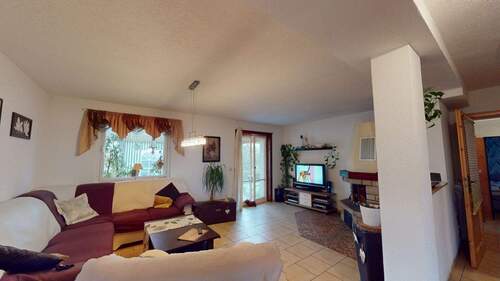 Wohnzimmer im Erdgeschoss - Einfamilienhaus mit 157,00 m&sup2; in Stolpen zum Kaufen