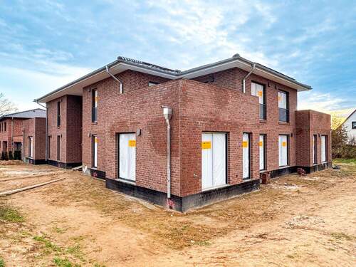 Außenansicht - MODERNE NEUBAUOBERGESCHOSSWOHNUNG IN RUHIGER UND ZENTRALER LAGE