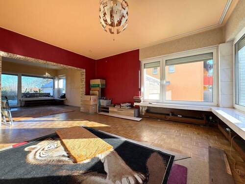 Wohnzimmer mit Zugang zum Garten - 3-Zimmer-Whg. im EG - 