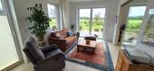 Wohnzimmer - Mehrfamilienhaus, Wohnhaus mit 173,40 m² in Ottersberg zum Kaufen