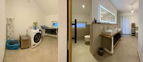 Bad OG und Hauswirtschaftsraum - 