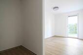 Schlafzimmer mit Ankleidebereich - 
