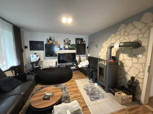 Wohnzimmer mit Kamin Obergeschoss - 