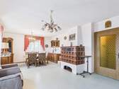Essbereich mit Kachelofen - Einfamilienhaus mit 115,00 m&sup2; in Ebern zum Kaufen