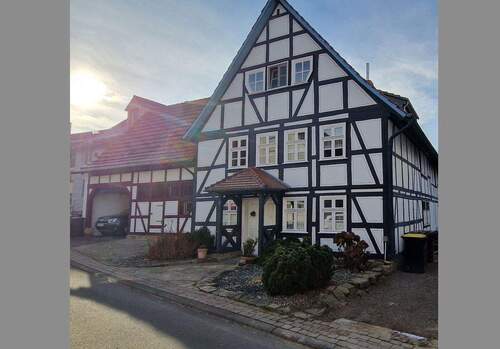 Seitenansicht - 1 Zimmer Mehrfamilienhaus, Wohnhaus zum Kaufen in Immenhausen