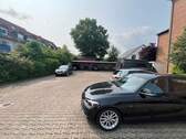 Hofansicht mit Carport - 
