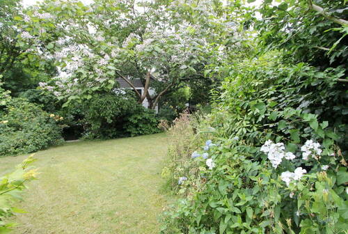 Blick auf die Rückseite des Hauses - Einfamilienhaus mit 145,00 m&sup2; in Hamburg zum Kaufen