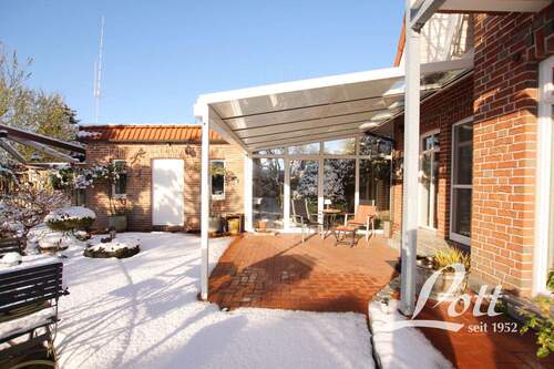 Terrassenbereich - Einfamilienhaus mit 197,90 m&sup2; in Großefehn / Ostgroßefehn zum Kaufen