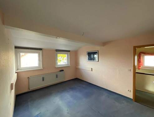 Schlafzimmer im Dachgeschoss - 
