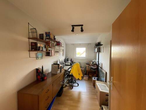 Zimmer im Dachgeschoss - 