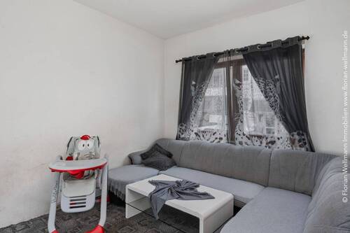 Wohnzimmer im Erdgeschoss11.11m² - 6 Zimmer Reihenmittelhaus in Bremen