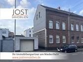 Titelbild - Gepflegtes Mehrfamilienhaus mit 3 Einheiten, Garage und solider Mietstruktur