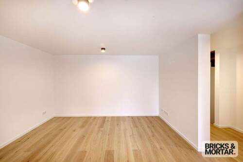 EG_Wohnzimmer - Terrassenwohnung mit 135,00 m&sup2; in München zum Kaufen