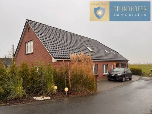 1 - Einzigartige Gelegenheit: Modernisiertes Einfamilienhaus direkt am Wasser