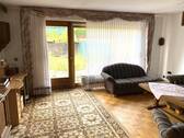 Wohnzimmer mit Zugang zum Garten - 