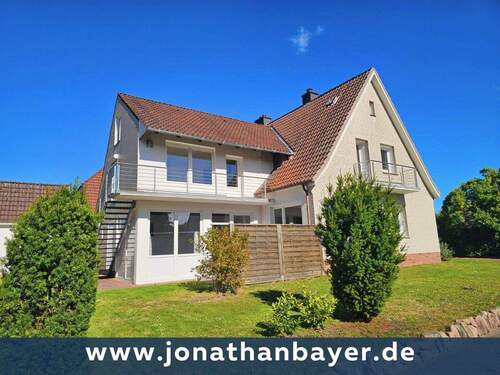 001 - Großzügiges Einfamilienhaus mit Einliegerwohnung in begehrter Wohnlage
