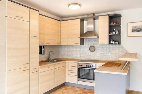 praktische Küche - Etagenwohnung mit 70,00 m&sup2; in München zum Kaufen