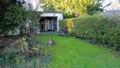 Garten und Garagenrückseite - 