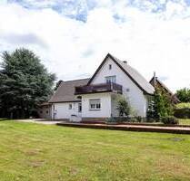 Wohnen und Arbeiten - vielseitiges Haus mit großem Grundstück und Potenzial in Hasbergen