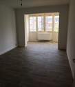 Wohnzimmer mit Wintergarten (Muster) - Etagenwohnung mit 46,80 m² in Gera zur Miete