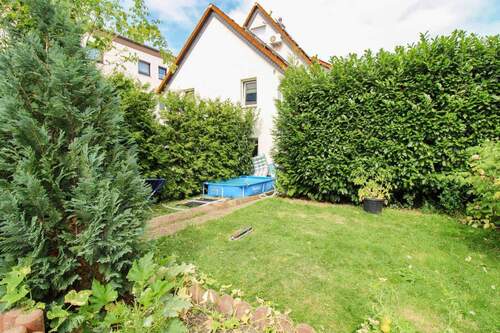 Garten - 8 Zimmer Mehrfamilienhaus, Wohnhaus zum Kaufen in Garbsen