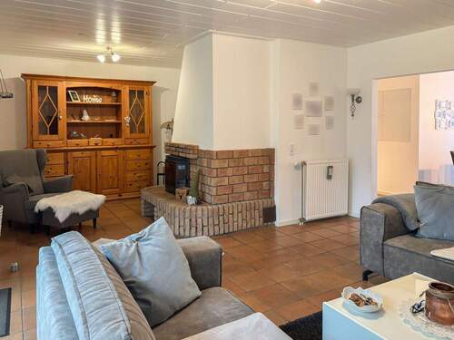 Wohnzimmer mit Kamin - 