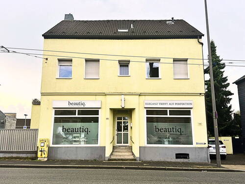 Aussenansicht - Provisionsfrei: Saniertes Mehrfamilienhaus mit Ladenlokal mit 32.500 € Jahresmiete