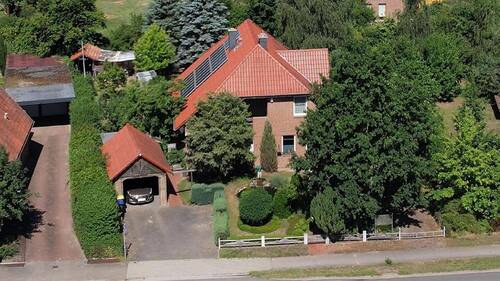 Bild 2 - 5 Zimmer Mehrfamilienhaus, Wohnhaus zum Kaufen in Wrestedt