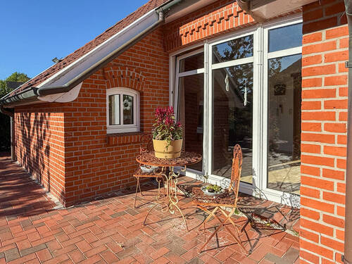 Terrasse nach Süden - Einfamilienhaus mit 160,00 m² in Südbrookmerland / Moordorf zum Kaufen
