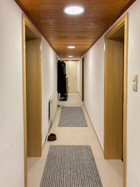 Flur mit Kaminofen(UG) - 