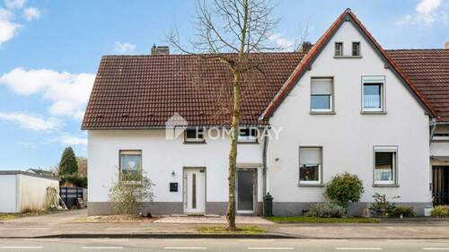 Außenansicht 1 - Historischer Charme trifft moderne Ausstattung - stilvoll saniertes Reihenendhaus in ruhiger Lage