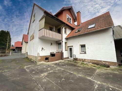 Außenansicht - Mehrfamilienhaus, Wohnhaus mit 211,00 m&sup2; in Meißner zum Kaufen