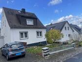Ansicht - 8 Zimmer Mehrfamilienhaus, Wohnhaus zum Kaufen in Fuldabrück