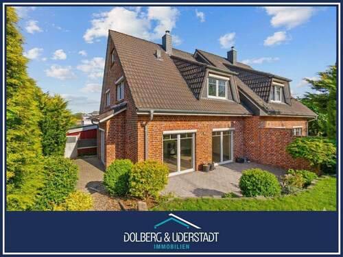 Titelbild - Einziehen & Wohlfühlen: Doppelhaushälfte mit Energieeffizienz A+, Kamin, Garten & Carport