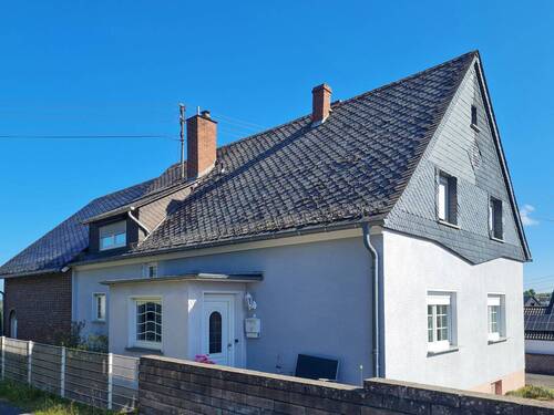 Seitenansicht - Einfamilienhaus mit 340,00 m&sup2; in Puderbach zum Kaufen