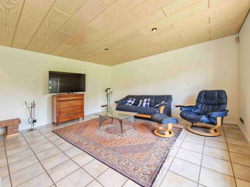 Wohnzimmer im EG - Einfamilienhaus mit 256,00 m² in Münsterdorf zum Kaufen
