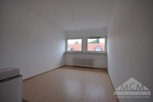 Wohnzimmer - Gepflegte Dachgeschosswohnung in ruhiger Lage Neu-Isenburgs