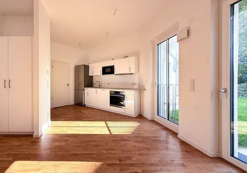 Wohnbereich - Geräumige 1-Zimmerwohnung, Süd-West-Ausrichtung mit Gartenzugang