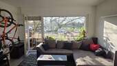Wohnzimmer mit Balkon - 