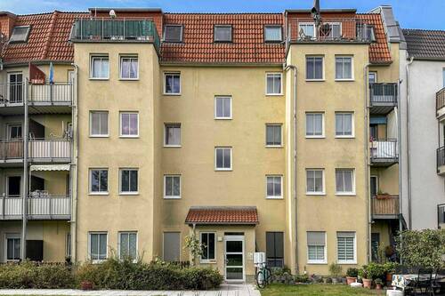 Rückansicht - Zukunftssicheres Investment: Langfristig vermietete 2-Zi.-ETW in Innenstadtlage
