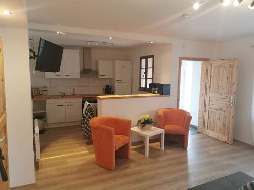 Aufenthalt und Küche von einer - 