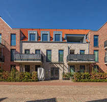Neuwertige Eigentumswohnung mit Loggia & TG-Stellplatz - Rendsburg