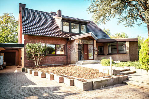 Vorderansicht - PROVISIONSFREI! Zweifamilienhaus mit viel Platz in Meppen-Esterfeld