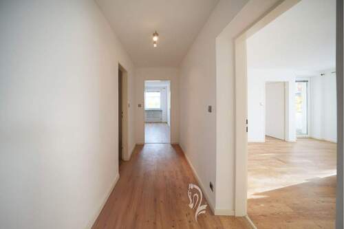 Flur mit Blick in das Wohnzimmer und Kinderzimmer - Etagenwohnung mit 71,00 m&sup2; in Würzburg zum Kaufen