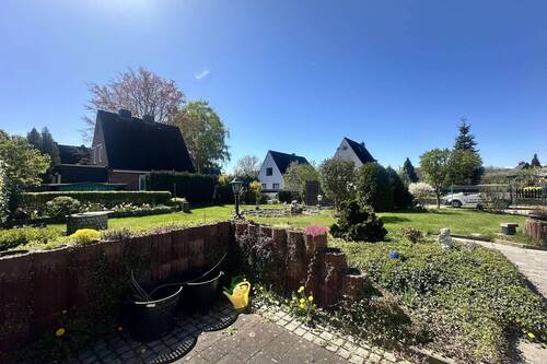 Garten - Einfamilienhaus mit 140,00 m&sup2; in Lübeck zum Kaufen