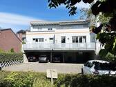Rückansicht mit Blick auf díe Dachterrasse + Stellplatz - 2 Zimmer Etagenwohnung zum Kaufen in Greven